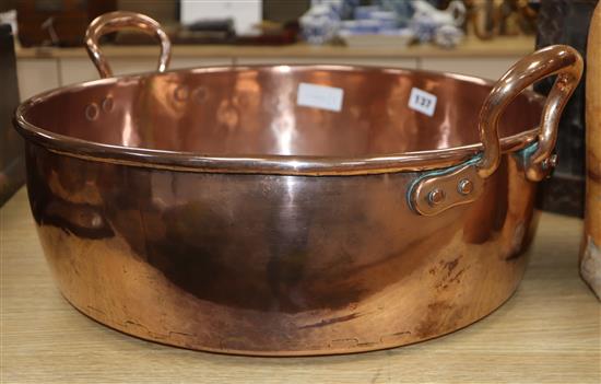 A Victorian copper preserve pan handle to handle 55cm